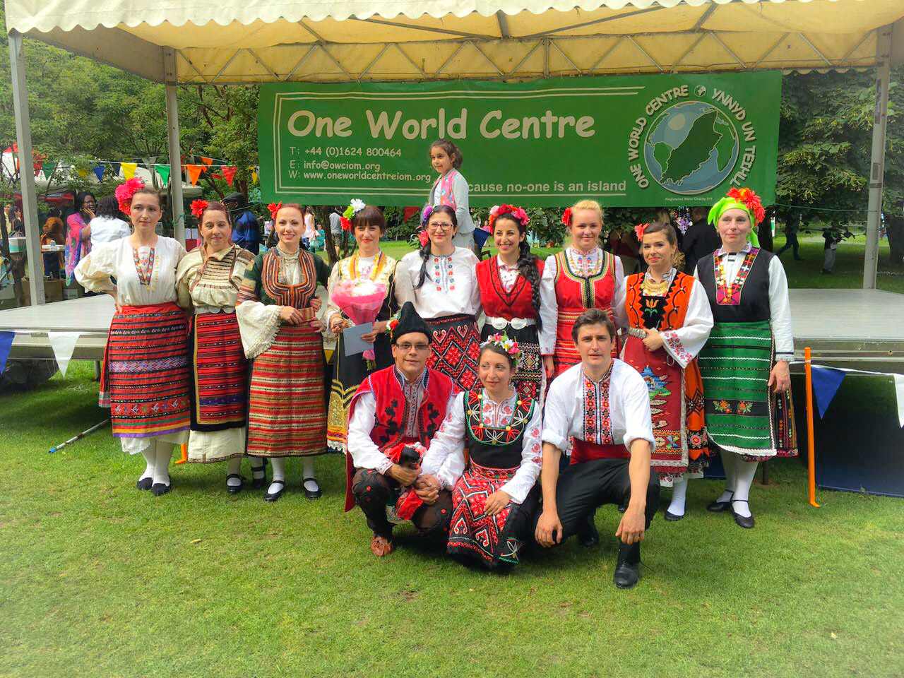 Bulgarians grouped in front of stage