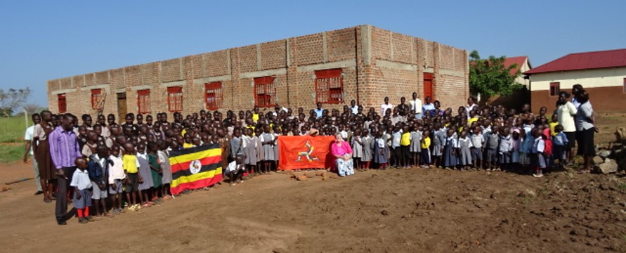 Broadway Primary School pupils with new hall building